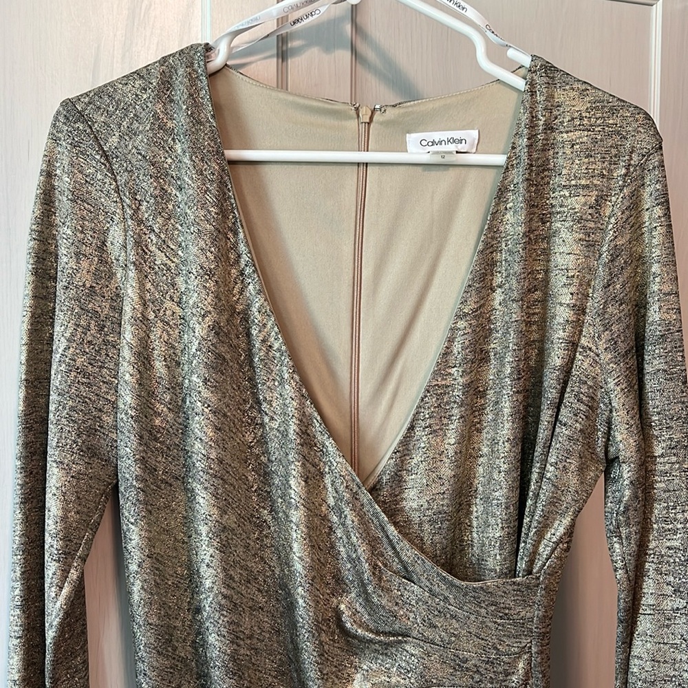 Stunning gold stretchy sexy size 12 dress by Calvin Klein at Macys